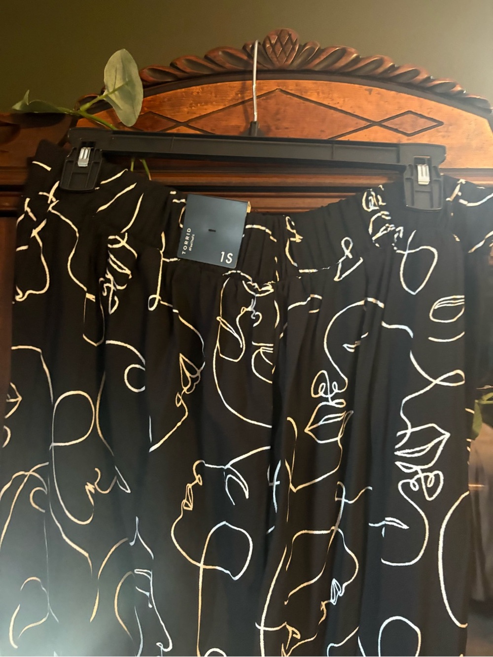 torrid Black Pants with White Abstract Face Line Print